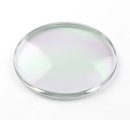 Clear lens with a faint green-violet anti-reflective sheen